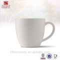 El blanco de cerámica al por mayor de China de la taza de café del drinkware, puede conseguir muestras libres